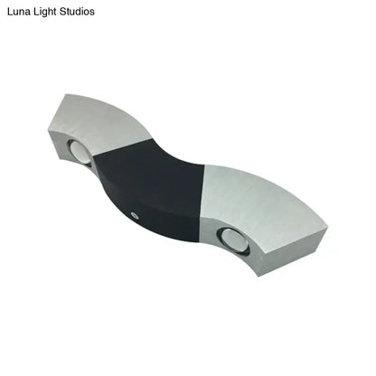 Black modern multicolor LED wall sconce by Decorbites, silver ends and black center, dual LEDs on Tampa Home & Garden Store