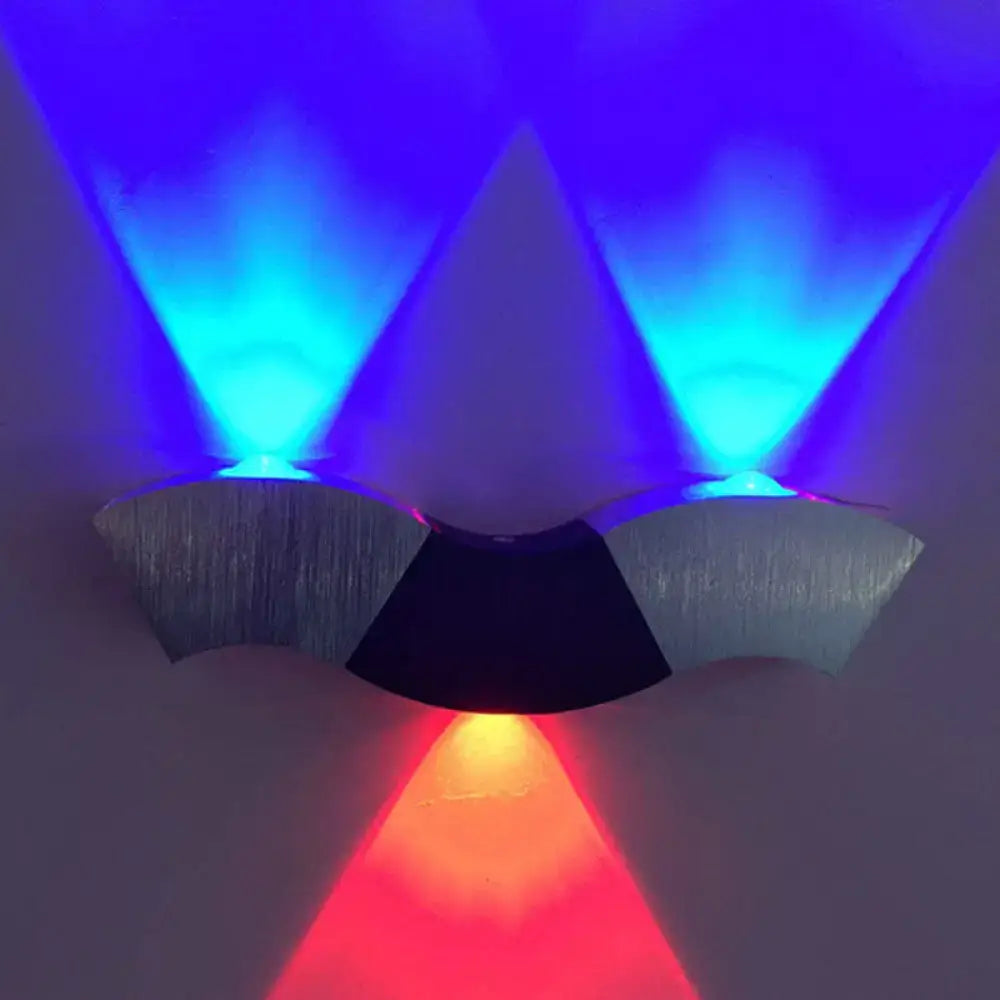 Black modern multi-color LED wall sconce by Decorbites with blue and red light projections on Tampa Home & Garden Store