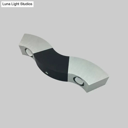 Black Modern Multi-Color LED Wall Sconce with black center and brushed aluminum ends on Tampa Home & Garden Store