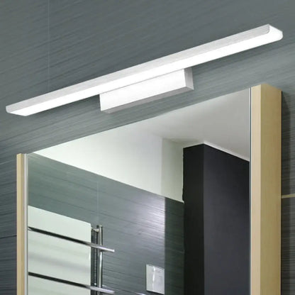 Modern aluminum bathroom vanity light, slim rectangular white bar mounted above mirror on Tampa Home & Garden Store