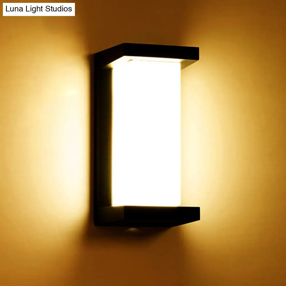 Black Sound Activated Sconce wall-mounted with black metal frame and frosted glass shade on Tampa Home & Garden Store