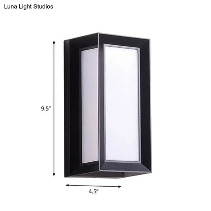 Black sound-activated wall sconce with frosted panel and metal frame Decorbites on Tampa Home & Garden Store