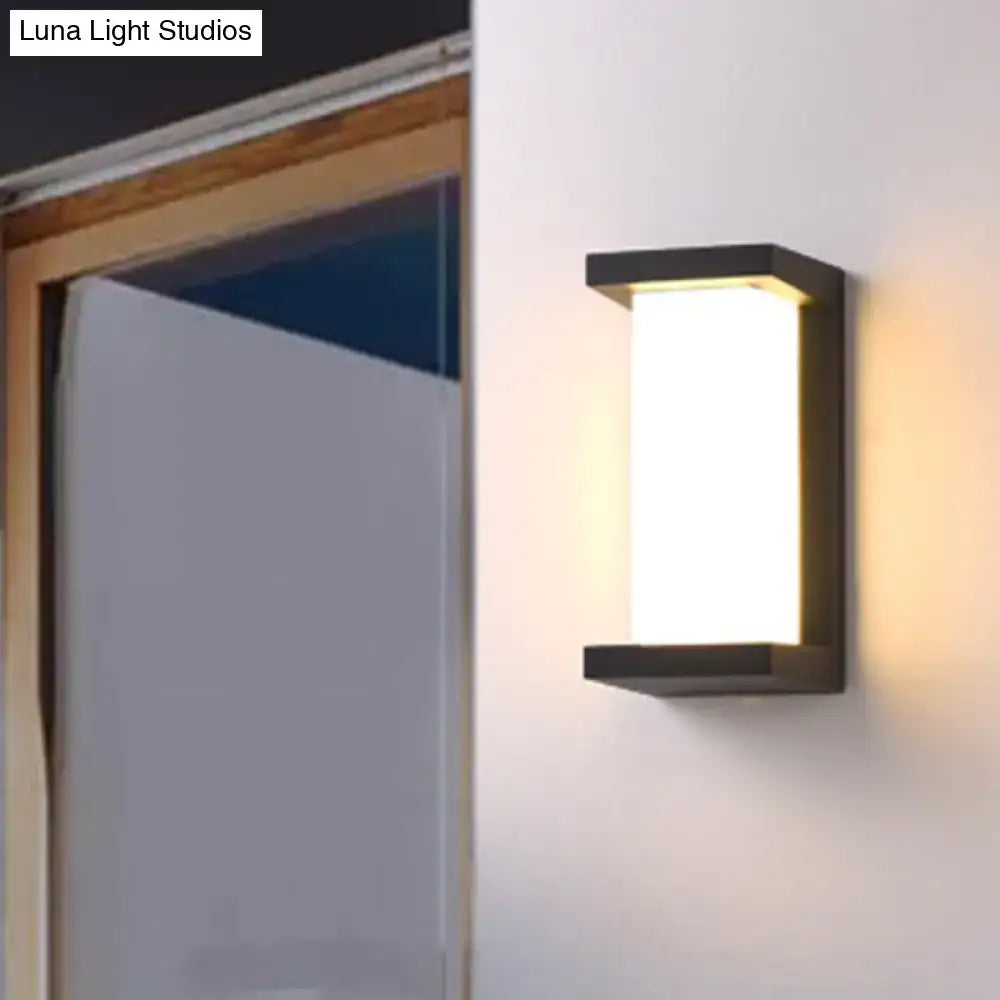 Black sound-activated sconce with white glass panel, Decorbites wall light on Tampa Home & Garden Store