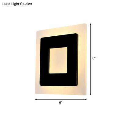Black square wall sconce Decorbites with inner square cutout and warm backlit glow, 6x6 in on Tampa Home & Garden Store