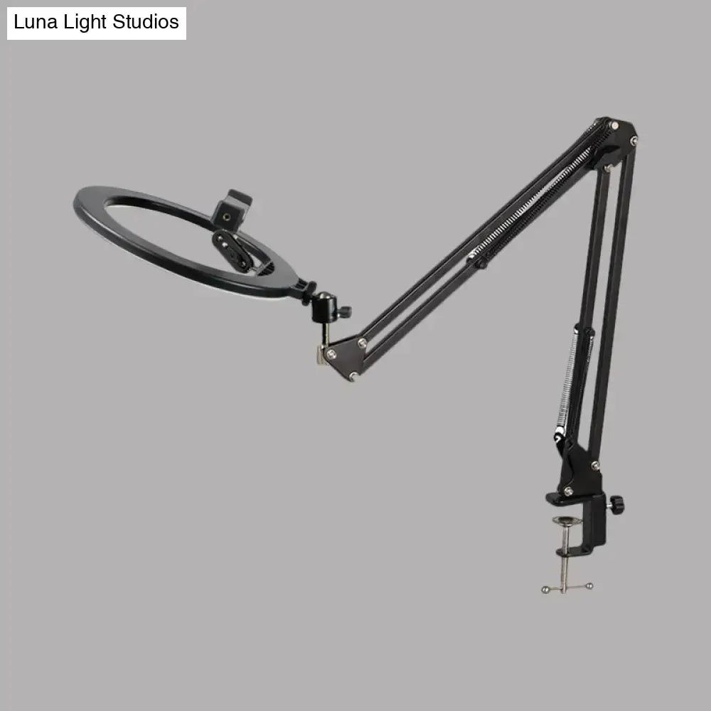 Black swing arm mirror light with round magnifier ring and adjustable metal arms Decorbites on Tampa Home & Garden Store