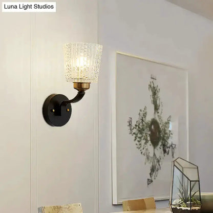 Modern black textured glass conical wall sconce by Decorbites with brass arm on Tampa Home & Garden Store