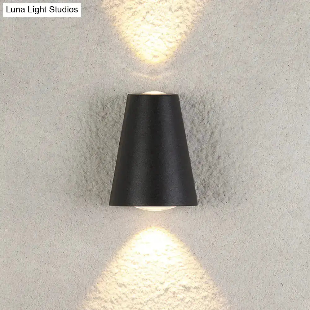 Modern black trapezoid outdoor wall light sconce with upward and downward glow Decorbites on Tampa Home & Garden Store
