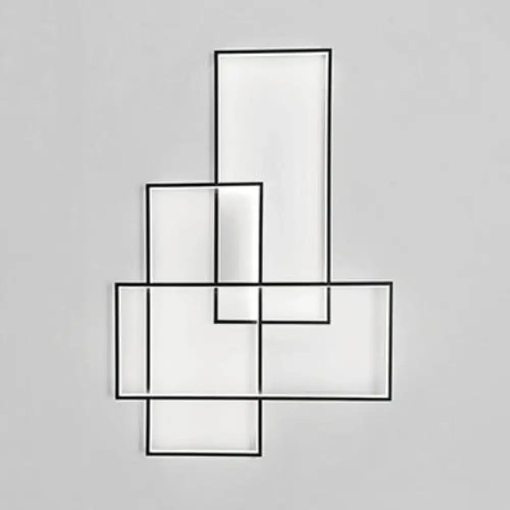 Black Acrylic Wall Sconce with white panels in a geometric overlapping frame by Decorbites on Tampa Home & Garden Store