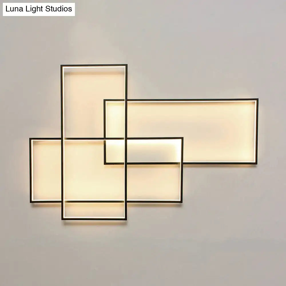 Black acrylic wall sconce by Decorbites with rectangular frames and warm backlit panels on Tampa Home & Garden Store