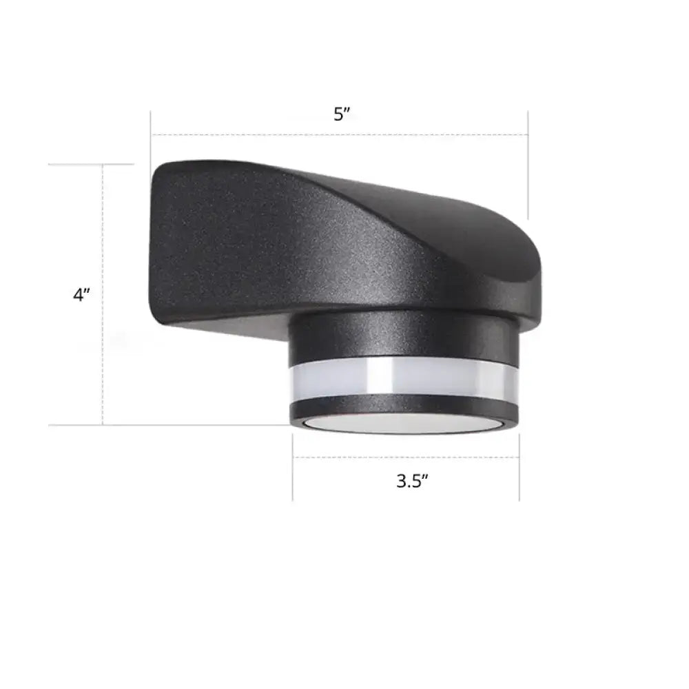 Decorbites black tubular wall sconce with cylindrical light housing and chrome accent ring on Tampa Home & Garden Store