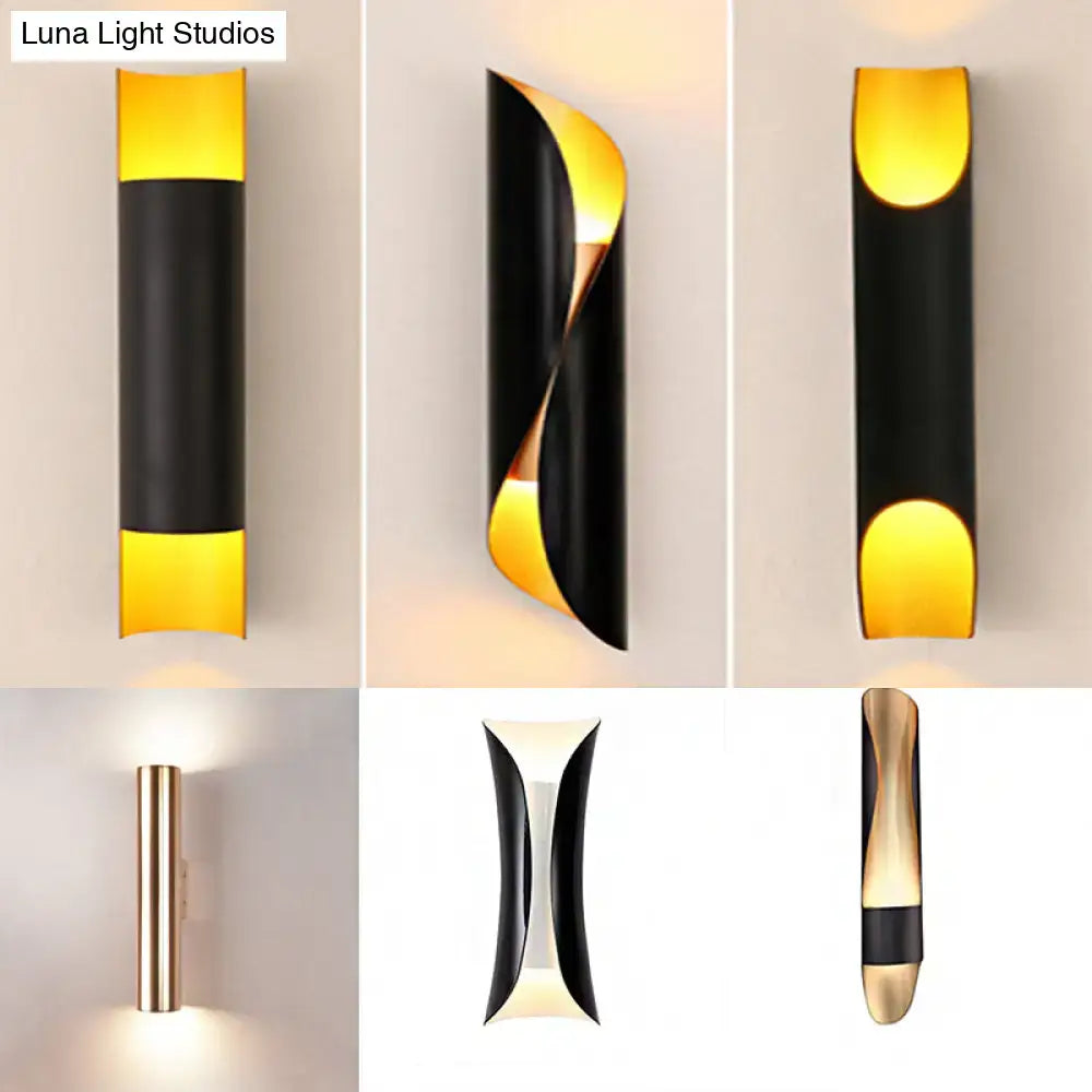 Black tubular wall lamp by Decorbites; six-view collage of a black cylindrical sconce with amber light on Tampa Home & Garden Store