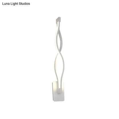 White twisted LED wall sconce with dual-arc design for contemporary decor by Decorbites on Tampa Home & Garden Store