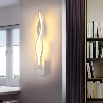 Black Twisted LED Sconce wall light by Decorbites with warm glow on Tampa Home & Garden Store