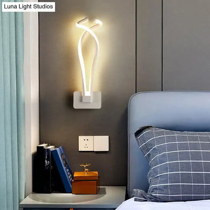Black Spiral LED Sconce wall light by Decorbites, black spiral tube with warm glow on Tampa Home & Garden Store