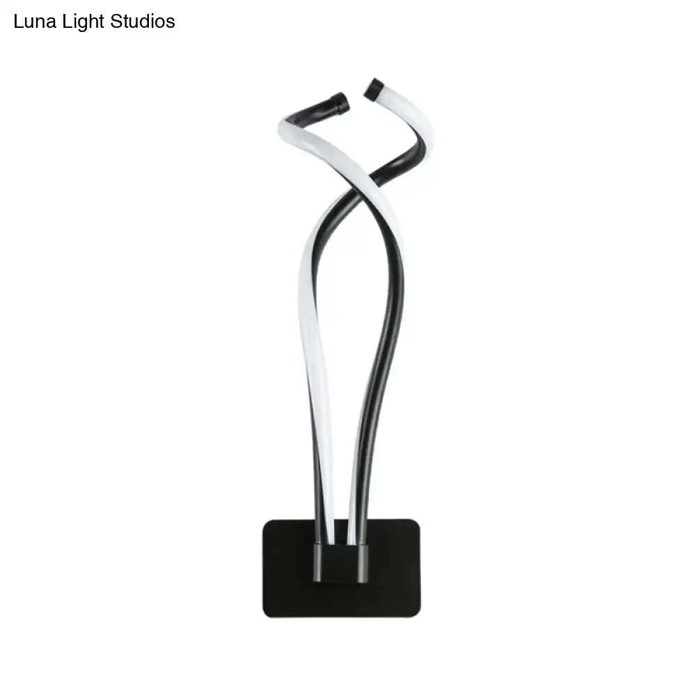 Black Spiral LED Sconce with twisted black and white metal tubes on black wall mount Decorbites on Tampa Home & Garden Store