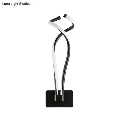 Black Spiral LED Sconce with twisted black and white metal tubes on black wall mount Decorbites on Tampa Home & Garden Store