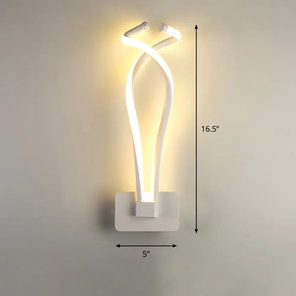 Black Spiral LED Sconce by Decorbites with warm white glow, wall mount on Tampa Home & Garden Store