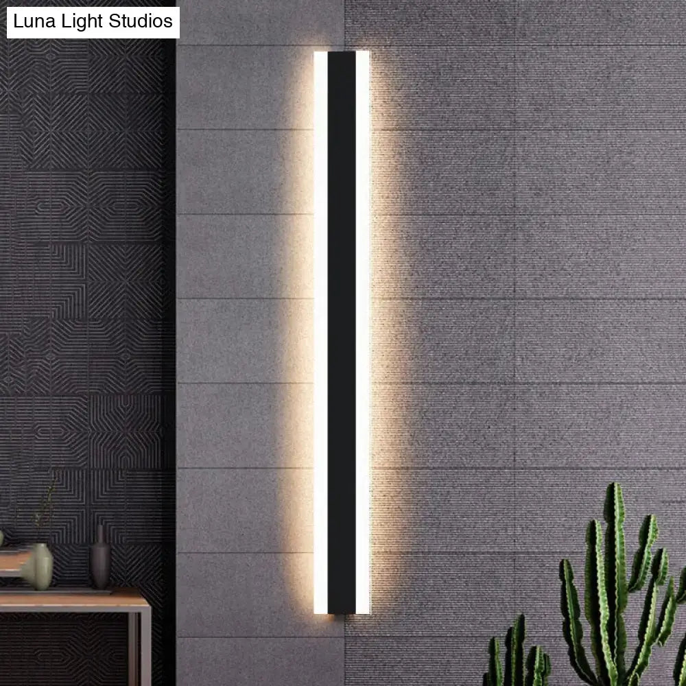 Modern black vertical LED outdoor wall sconce by Decorbites, IP65 waterproof with warm glow on Tampa Home & Garden Store