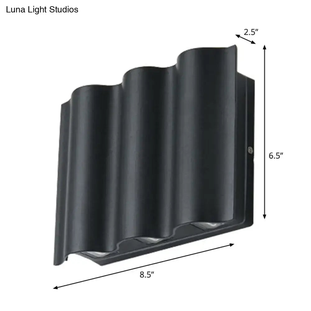Decorbites black wavy metal wall sconce 8.5in wide 6.5in tall 2.5in depth on Tampa Home & Garden Store