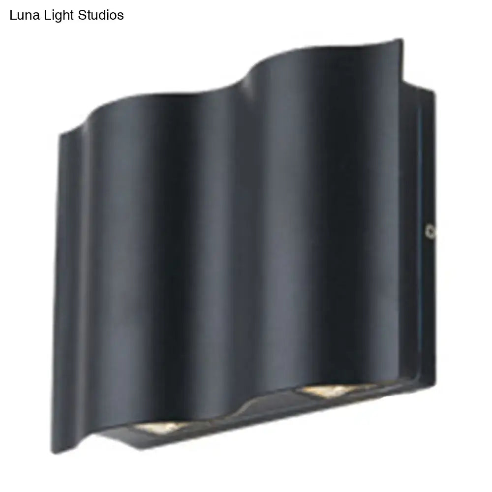Black wavy wall sconce Decorbites matte finish on Tampa Home & Garden Store