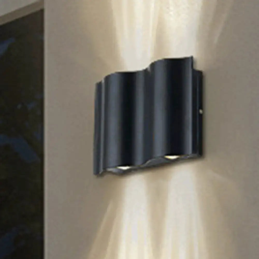 Black wavy wall sconce by Decorbites, metal finish, wall-mount lighting on Tampa Home & Garden Store