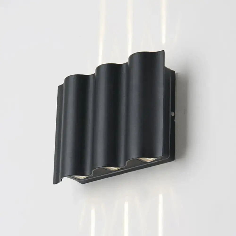 Black Wavy Wall Sconce black matte metal wave design on Tampa Home & Garden Store