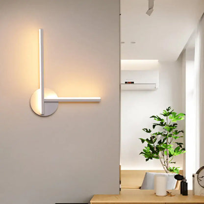 Wall sconce by Decorbites: modern black and white acrylic cross with warm white light on Tampa Home & Garden Store