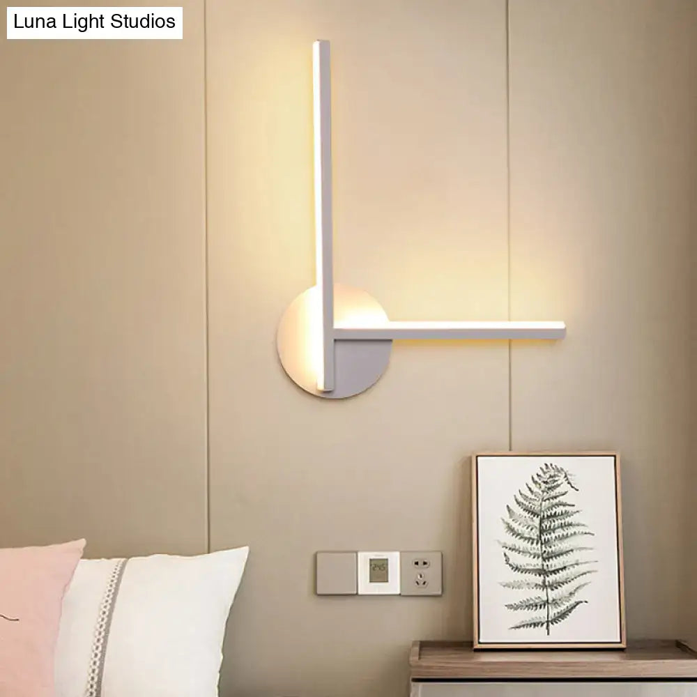 Decorbites modern black & white acrylic cross wall sconce with warm white LED light on Tampa Home & Garden Store
