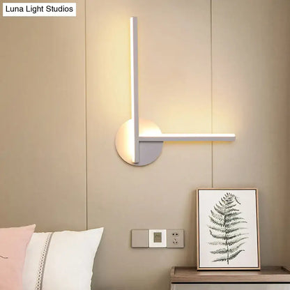 Decorbites modern black & white acrylic cross wall sconce with warm white LED light on Tampa Home & Garden Store