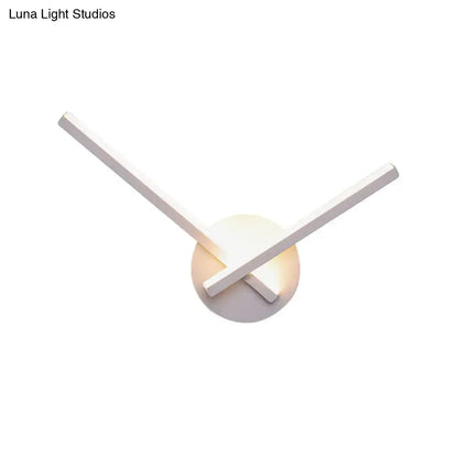 White acrylic cross wall sconce with intersecting arms warm white light Decorbites on Tampa Home & Garden Store