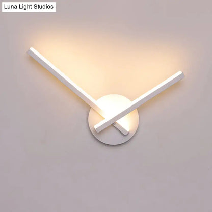 Modern black & white acrylic cross wall sconce with warm white light by Decorbites on Tampa Home & Garden Store