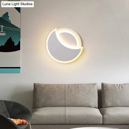 White Eclipse Wall Sconce by Decorbites, circular crescent LED wall light for modern spaces on Tampa Home & Garden Store
