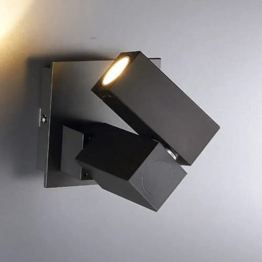 Black cube wall light by Decorbites; two angular black blocks with warm LED beam on Tampa Home & Garden Store