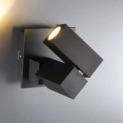 Black cube wall light by Decorbites; two angular black blocks with warm LED beam on Tampa Home & Garden Store