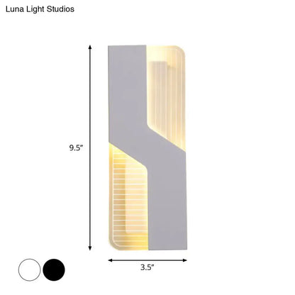 White angular wall sconce by Decorbites with ribbed light panel and warm glow, 9.5×3.5 in on Tampa Home & Garden Store