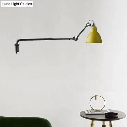 Modern black articulated bedroom wall lamp with yellow shade by Decorbites on Tampa Home & Garden Store