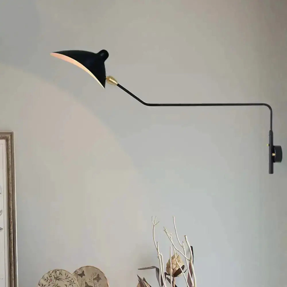 Decorbites black and white wall sconce with brass joint and adjustable arm on Tampa Home & Garden Store