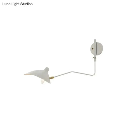 Decorbites white articulated wall sconce with curved arm and petal shade brass accent on Tampa Home & Garden Store