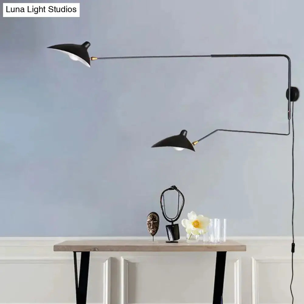 Modern black and white articulated wall sconce with dual arms, Decorbites light fixture on Tampa Home & Garden Store