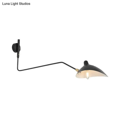 Modern black wall sconce by Decorbites with adjustable arm and white interior shade on Tampa Home & Garden Store