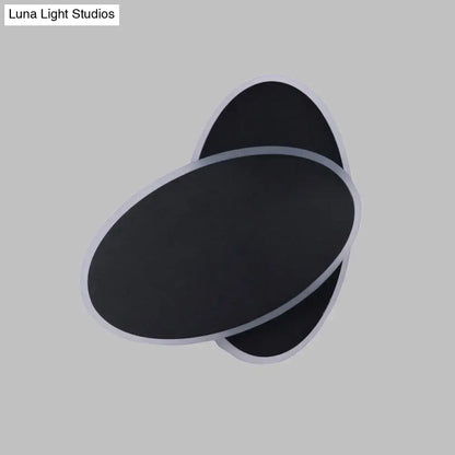 Black oval wall sconce by Decorbites, metal wall light for home decor on Tampa Home & Garden Store