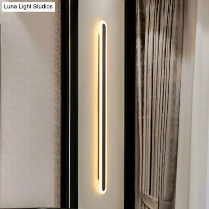 Modern black & white elliptical acrylic wall sconce by Decorbites, vertical LED aisle light on Tampa Home & Garden Store