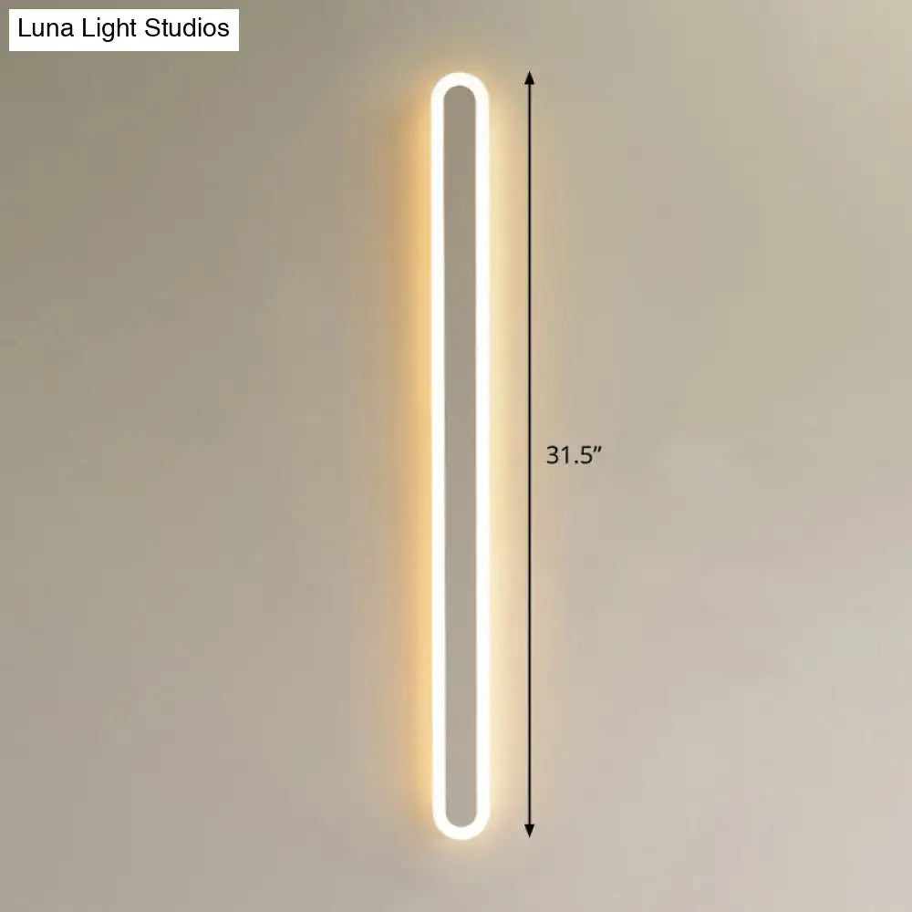 Decorbites black and white elliptical acrylic wall sconce, 31.5in tall, vertical aisle light on Tampa Home & Garden Store