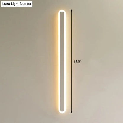 Decorbites black and white elliptical acrylic wall sconce, 31.5in tall, vertical aisle light on Tampa Home & Garden Store