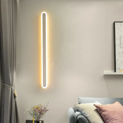 Modern black & white elliptical acrylic wall sconce with vertical LED light Decorbites on Tampa Home & Garden Store