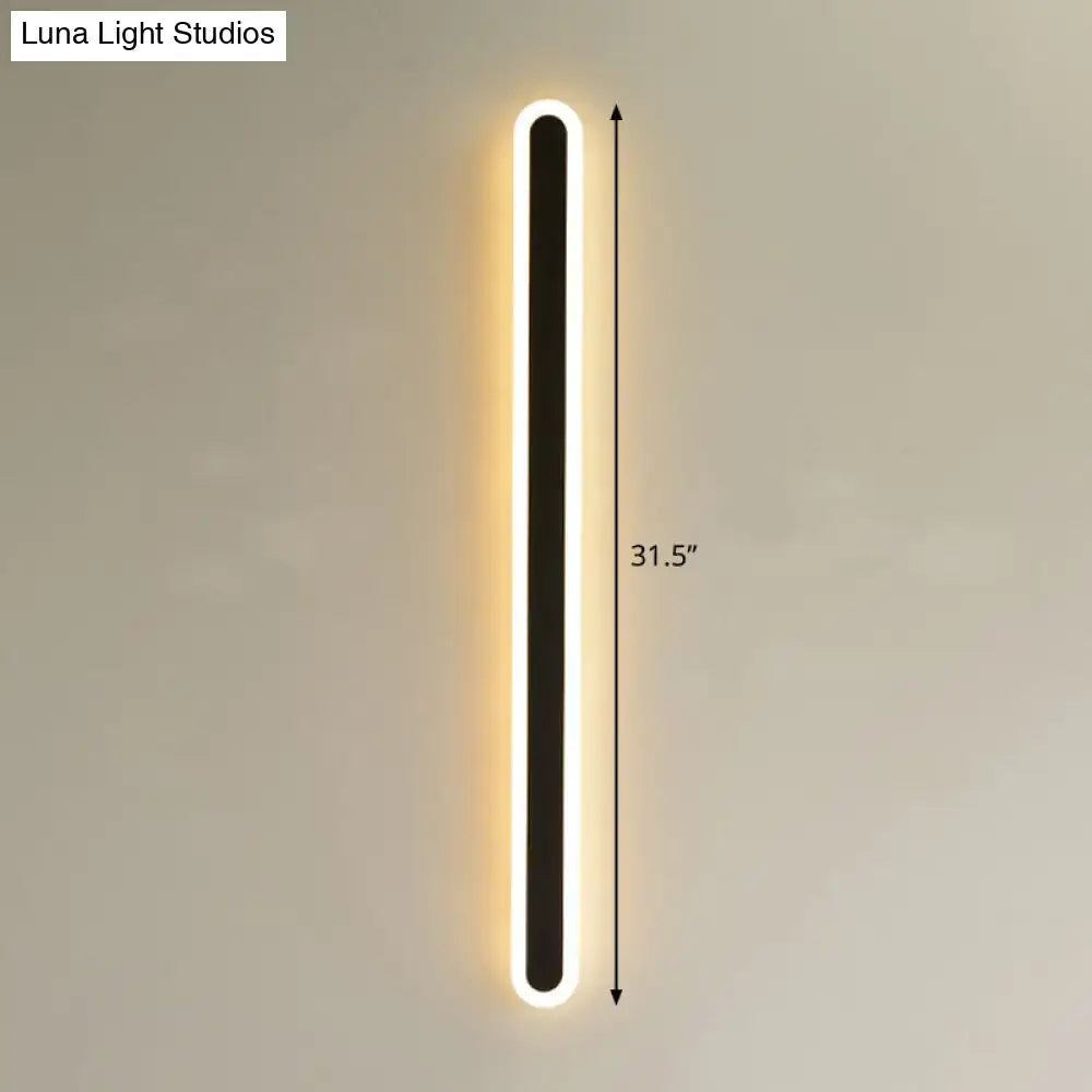 Decorbites modern black and white elliptical acrylic wall sconce on Tampa Home & Garden Store