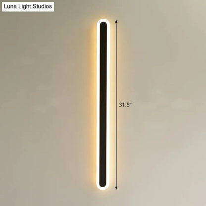 Decorbites modern black and white elliptical acrylic wall sconce on Tampa Home & Garden Store