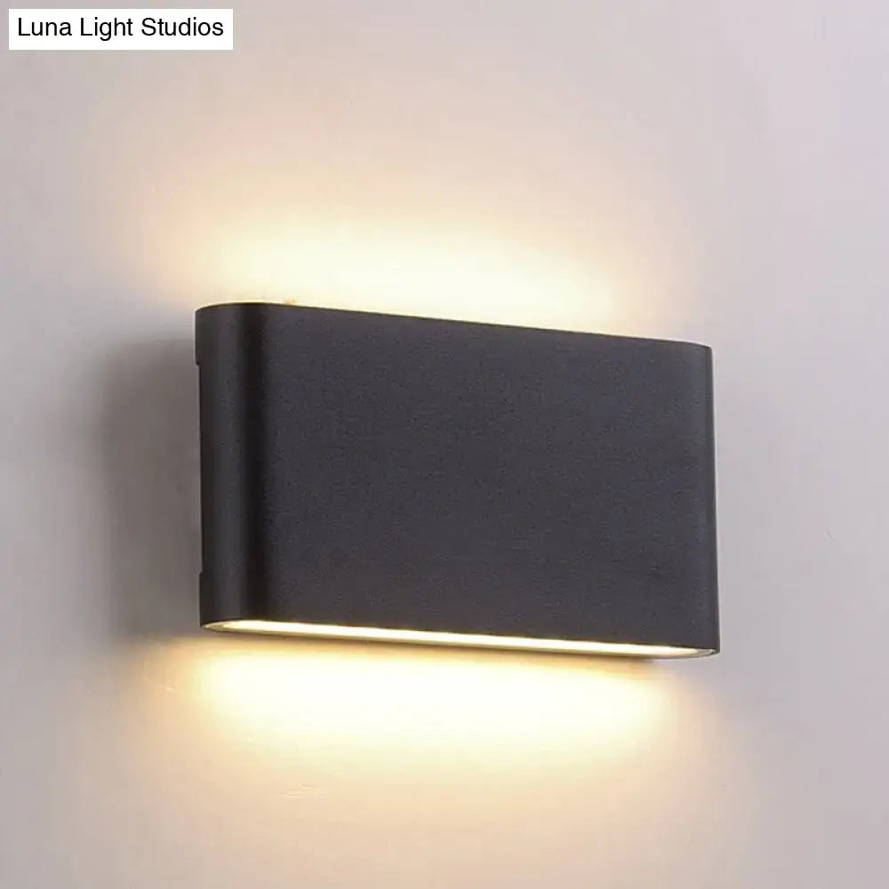Decorbites black oblong wall lamp with matte finish and up-down glow Luna Light Studios on Tampa Home & Garden Store