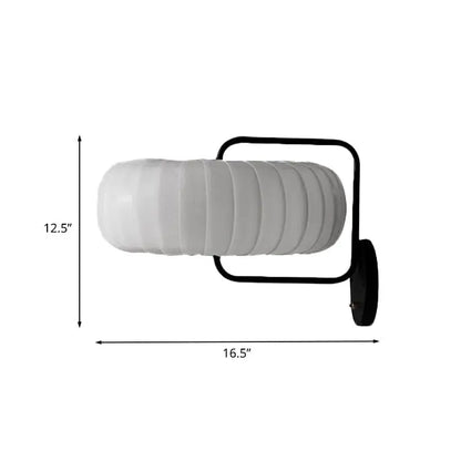 Black Pumpkin Wall Sconce by Decorbites with ribbed glass shade and black metal frame on Tampa Home & Garden Store