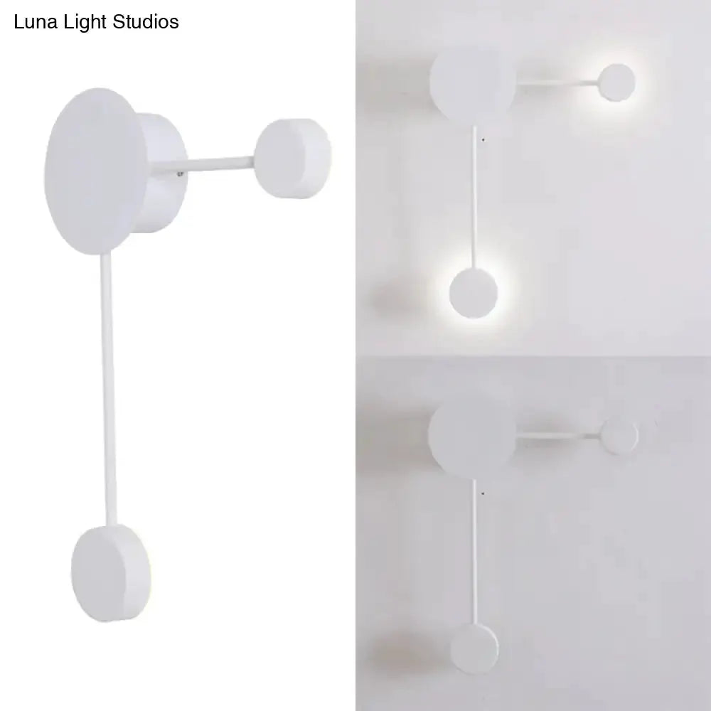Decorbites white geometric wall sconce with circular discs and hanging rod on Tampa Home & Garden Store